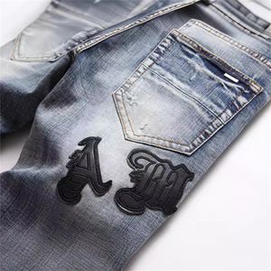 Herenjeans klassieke kruisbroek vintage blauw high street punk gat Slanke elastische jeans met kleine pijpen gebroken bedelaarsbroek met letterpatch