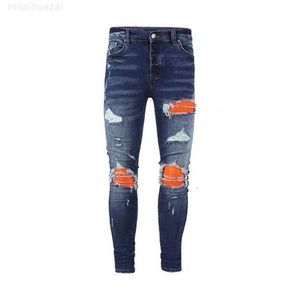 Jeans de hombre Ropa Jeans Hombres Mujeres Estampado de pantera Ejército Verde Largo Desgastado Algodón Conejo Etiqueta Bordado Delgado Denim Recto Biker Pantalones pitillo