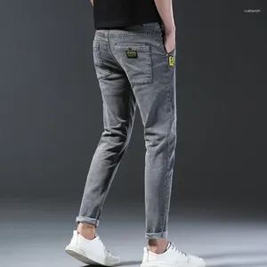 Design de jean masculin denim gris décontracté extension slim petit pieds longs pantalons de rue longs mode polyvalent pantalon quotidien printemps été