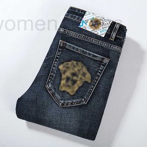 Jeans pour hommes Designer 2022 Été Nouveaux jeans, personnalité masculine, marque de mode, luxe léger, élastique, coupe slim, pantalon de style européen FS34