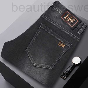 Heren jeans ontwerper 2023 herfst en winter nieuwe Europese high -end kwaliteit elastische slanke fit kleine rechte zwarte casual broek llal