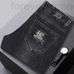 Men's Jeans Designer 2023 Automne / hiver Nouvelle marque de mode européenne pour hommes et jeunes édition coréenne Slim Fit Small Feet Elastic Broidered Black Pants 8pn0