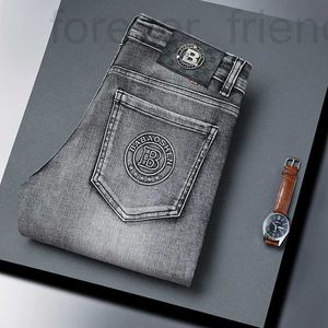 Men's Jeans Designer 2023 Automne / hiver Nouvelle marque de mode européenne pour hommes et jeunes coréens édition slim slim small pieds élastiques en relief pantalon tkzx