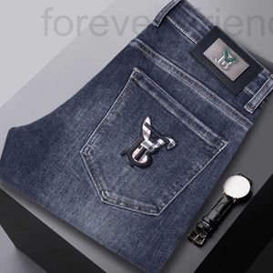 Heren jeans ontwerper 2023 herfst/winter nieuw Europees modemerk voor mannen en jeugd Koreaanse versie slank fit kleine voet elastische borduurwerk casual broek hlv6