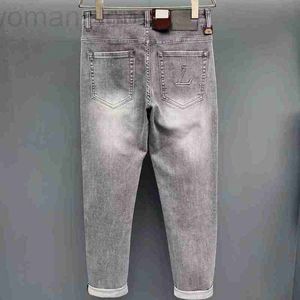 Herenjeans Designer 2023 Mode klassieke jeans herenstijl hot print gat geschilderd slanke stretch bedrukte kleine voeten denim WZMF