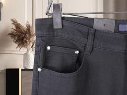 Herenjeans ontwerper 2023 nieuwste aanbieding skinny jeans heren Driehoek label letters patroon Bloemenprint broek Mannen mode Designer Hip Hop wit