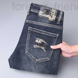 Heren jeans ontwerper 2023 Nieuwe licht luxe Koreaanse editie dikke elastische slank fit merk b broek 66Z1