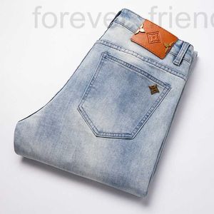 Heren jeans ontwerper 2024 Nieuwe high -end Europees lichtblauw Slim fit klein rechte elastische trendy merk casual veelzijdige broek sxfr