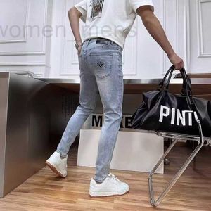 Heren jeans ontwerper 2024 lente/zomer nieuwe high -end licht kleur gewassen reliëf slank fit veelzijdige rechte been 1tzu