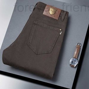 Heren jeans ontwerper 2024 lente/zomer nieuw Europees modemerk voor mannen en jeugd Koreaanse fit elastische katoenen koffie casual broek 46dt