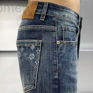 Jeans pour hommes Designer Automne et hiver Guangzhou Xintang Coton Printemps Édition coréenne Slim Fit Noir Haut de gamme Pantalon bleu européen EHK1