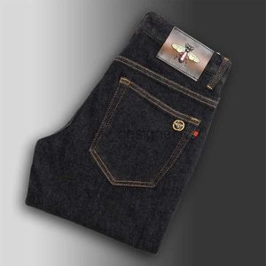 Heren jeans ontwerper herfst en winter high-end licht luxe zwarte zwarte heren slanke fit casual broek met kleine voeten elastische dikke kleine rechte poot jeans