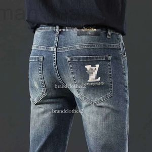 Heren jeans ontwerper herfstmodemerk Koreaanse slanke pit broek slanke fit dikke geborduurde blauw grijze broek l1e8