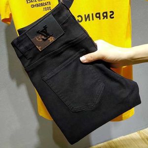 Diseñador de jeans para hombres Jeans estampados negros Marca de moda para hombres Verano Nuevo ins Versión coreana Tendencia Pantalones de pierna pequeños ajustados para hombres LY8 Z659