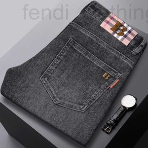 Heren jeans designer merk 2024 High -end lente/zomer nieuwe casual slanke pasvorm kleine rechte pijp rokerige as elastische katoenen dunne stijl m4pn