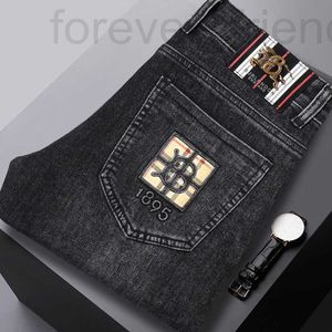 Marque de concepteur de jeans masculin automne et hiver épais denim épais élastique slim élastique petit tube droit européen pantalon polyvalent à la mode à la mode haut de gamme E7F0