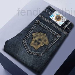 Jeans pour hommes Designer Marque Été Nouveau Mode Personnalisé Léger Luxe Élastique Slim Fit Tendance Européenne Petits Pieds Pantalon 7AS8