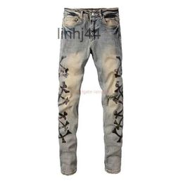 Jeans pour hommes Vêtements de créateurs Amires Pantalons en denim Amies Street Camouflage Os avec des trous coupés au couteau en cuir lavés dans le vieux Me0GZY