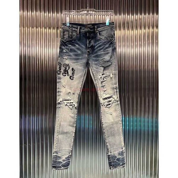 Jeans para hombres Ropa de diseñador Amires Pantalones de mezclilla Amies Nueva marca de moda Deep Blue High Street Cashew Flower Patch Hole EmbroYREK