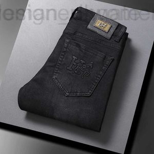 Jeans pour hommes Designer Guangzhou Xintang Coréen Slim-Fit Pantalon Slim Fit épais Jeunesse européenne Pure Black Automne et hiver Marque de mode ZZVE 8HFN