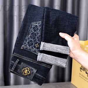 Jeans pour hommes Designer européen pour hommes automne / hiver épais design d'impression à la mode avec un pantalon élastique polyvalent de luxe léger NTYK U71W