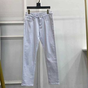 Heren jeans ontwerper European lente/zomer witte jeans voor mannen nieuw product high -end kwaliteit grote koe slanke kleine fit kleine voeten lange broek trendy jeugd 1888