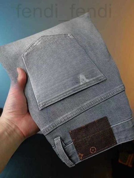 Jeans para hombres Diseñador Jeans de moda Top line tch wash elementos de motorcye impresos Elástico casual con colores nostálgicos YZKP