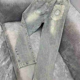 Jeans pour hommes Designer à la mode et élégant visage gaufré pour hommes 2023 Été Nouvelle taille haute coréenne Slim Crop Pantalon droit Tendance 819A