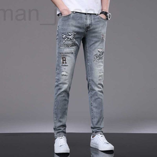 Diseñador de jeans para hombres Jeans de alta gama para hombres, productos nuevos de primavera y verano, pies pequeños elásticos ajustados, versión coreana, estilo combinado de bordado, ropa de la familia G