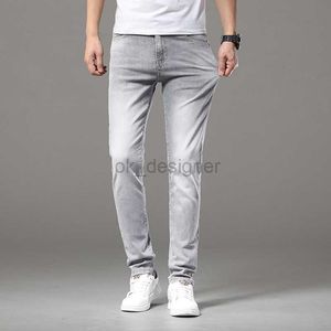 Heren jeans ontwerper high -end kwaliteit trendy heren jeans slim fit elastische adelaar logo licht grijs casual broek