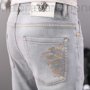 Designer de jeans masculin Hong Kong High End Fashion Brand 2022 Nouveau pantalon d'été polyvalent Slim Fit Small Foot pour hommes ZDG6 GSMC