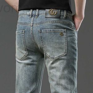 Jeans pour hommes Jeans de marque tendance de Hong Kong pour hommes, haut de gamme usé, luxe léger, coupe ajustée, pantalon élastique et polyvalent automne hiver, style épais 68LM