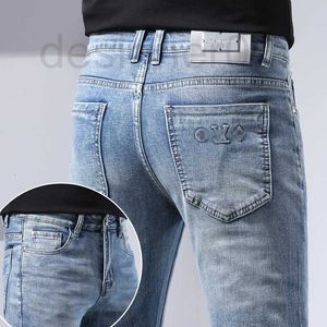 Herenjeans designer jeans heren lichtblauwe slim fit kleine voeten high-end lente dunne lange broek 5W6W