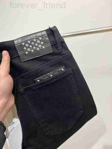 Brand de luxe de concepteur de jeans masculin, Brand de luxe, noir, printemps et été slim ajustement, petite jambe droite élastique pantalon décontracté européen wf2l