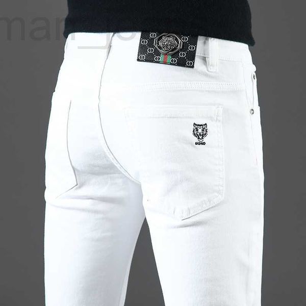 Designer de jeans pour hommes Diffusion en direct de Guangzhou Xintang Jeans, Cotton Bullet, Version coréenne, Slim Fit, Produits européens haut de gamme, Tête de tigre noir et blanc NY6I