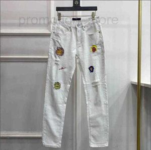 Jeans para hombres Diseñador Lujo Primavera / Verano Elegante Europeo Gama alta Marca de moda Artesanía pesada Productos lavados Elástico Slim Fit Pierna pequeña 38 9A27