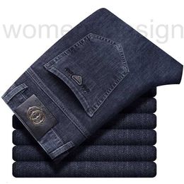 Jeans da uomo firmati di lusso Jeans elastici sottili primaverili per pantaloni da lavoro leggeri da uomo slim fit in denim a gamba dritta lunghi E2Q9