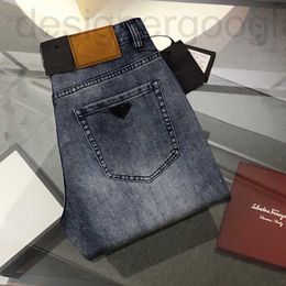 Heren Jeans ontwerper Heren jeans broek klassieke driehoek borduurwerk denim broek mode losse pantalons rits toegang rechte pijpen Broek 8L5N