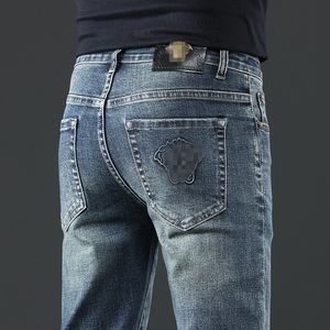 Jeans pour hommes Designer Hommes lâche jean vers pantalon business casual long medusa plaqué or bouton homme pantalons de survêtement baggy jeans pour hommes XW1