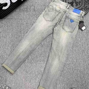 Jeans pour hommes Designer Mens Stretch Triangle Slim Bleu clair Lettre Stretch Marque Pantalon de luxe Jean Trend Casual JR0L 8I2W