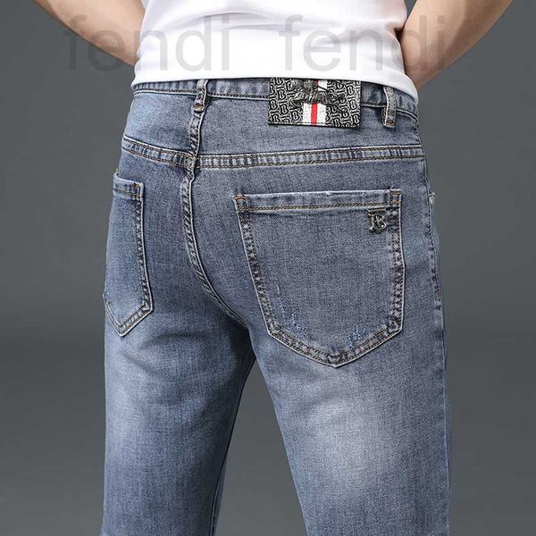 Jeans pour hommes Designer Nouvelle marque de mode Jeans Tendance des jeunes hommes Leggings minces Pantalons longs polyvalents décontractés 3FCC