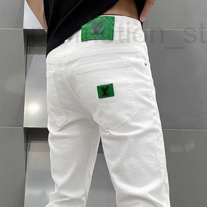 Heren jeans ontwerper nieuwe high-end witte slanke fit elastische kleine rechte poot jeans voor lente en zomer, heren trend casual veelzijdige Europese lange broek 8y52