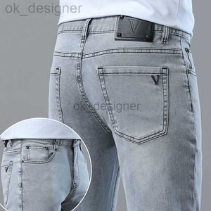 Heren jeans ontwerper nieuwe jeans herengoederen lente en zomer nieuwe slanke voeten elastische casual broek trend