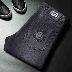Designer de jeans pour hommes Lettres d'automne imprimées Drill Slim Fit Tube droit Tendance de la mode Loisirs et Pantalon lavé tout usage IJX1