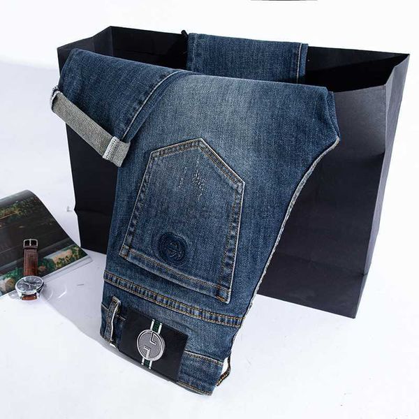 Jeans diseñador de jeans para hombres Jeans europeos Jeans delgados Fit Agua de agua elástica Pantalones de mezclilla de pierna recta