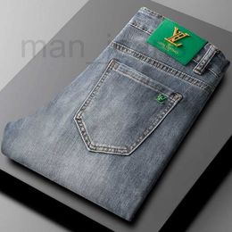 Designer de jeans masculin printemps et automne bleu clair jeans haut de gamme pour hommes de mode luxurale légers masculins élastique slim small small pieds pantalons hn02