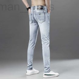 Diseñador de pantalones vaqueros para hombre Primavera y verano 2021 moda a estrenar pantalones vaqueros azul claro elásticos para hombre Pantalones rectos de pierna pequeña delgados ETSQ