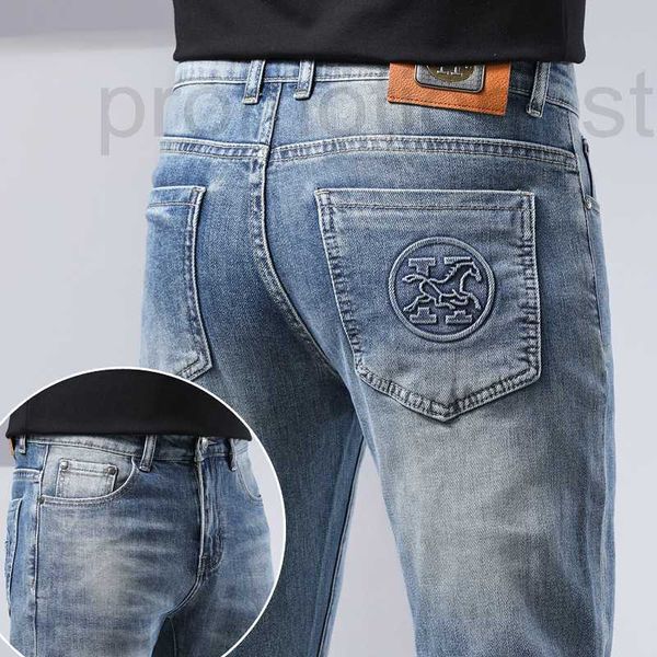 Designer de jeans masculin Spring Blue Blue Slim Fit Small Feet High End Thin Brand H Long Pantal