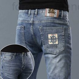 Designer de jeans masculin printemps nouveaux vêtements masculins de style européen à la tendance petite jambe pantalon élastique élastique mince lwq7