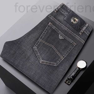 Designer de jeans masculin printemps / été 2022 Jeans pour hommes minces hommes lâches pantalons décontractés de taille haute élastique